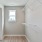 Small window in walk-in closets in bedrooms at Lookout View Townhomes