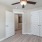 Hardwood-inspired plank flooring in bedrooms at Lookout View Townhomes