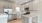 C-shaped kitchen with recessed lighting in townhomes at Lookout View