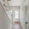 Staircase facing home entrance in homes at Lookout View Townhomes