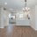 Open counter in kitchen faces dining area in home at Lookout View Townhomes