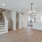First floor living area with staircase in homes at Lookout View Townhomes